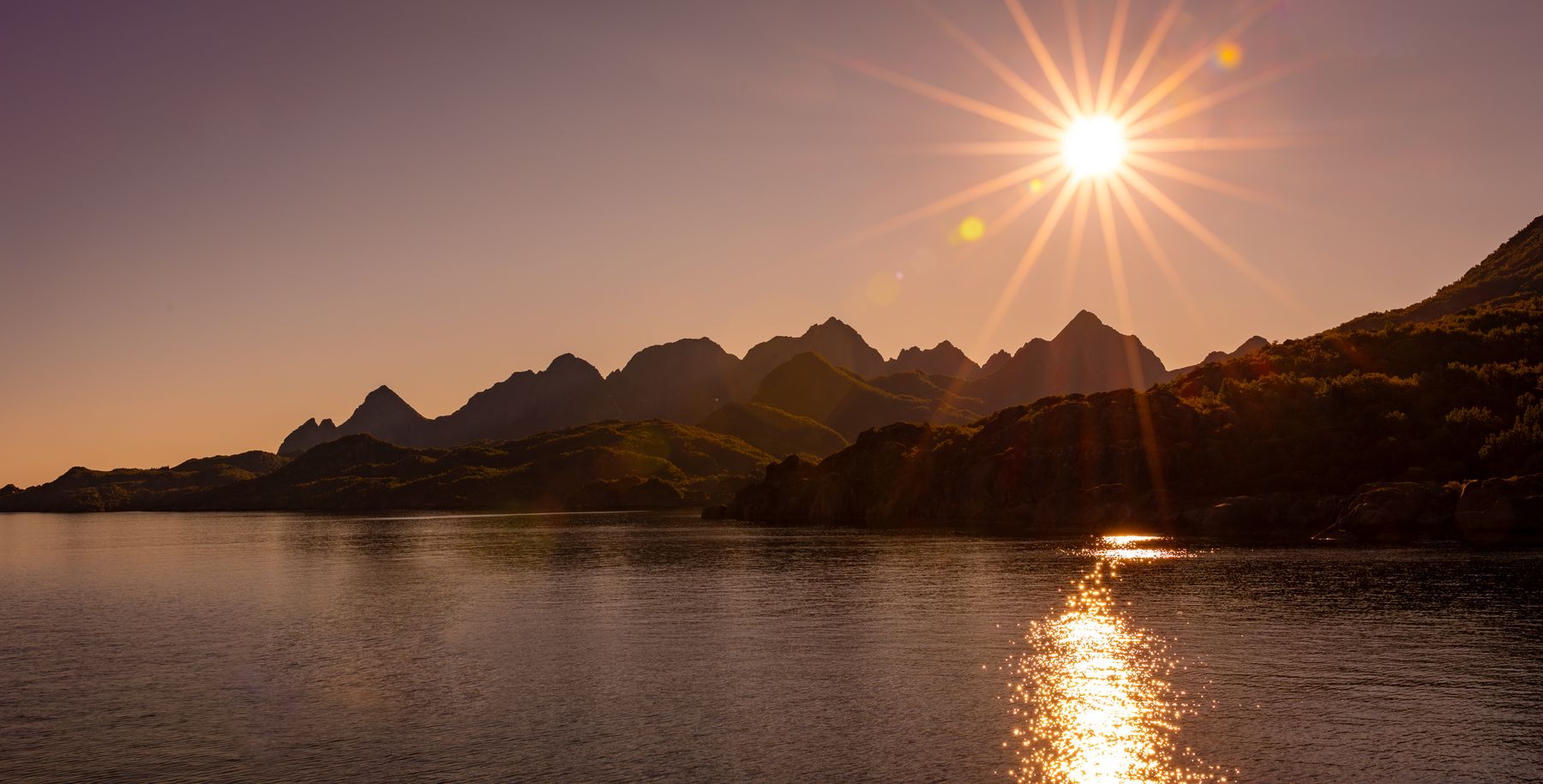 Sunburst Over Island Mountains
